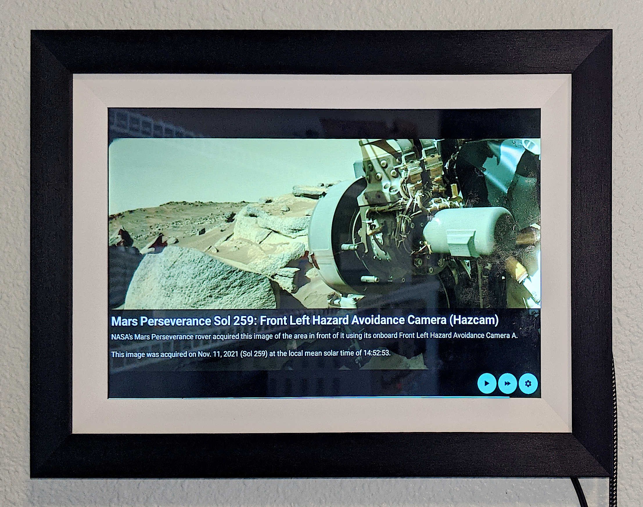 My custom Mars Photo Stream app running on the picture frame, displaying information overlay.